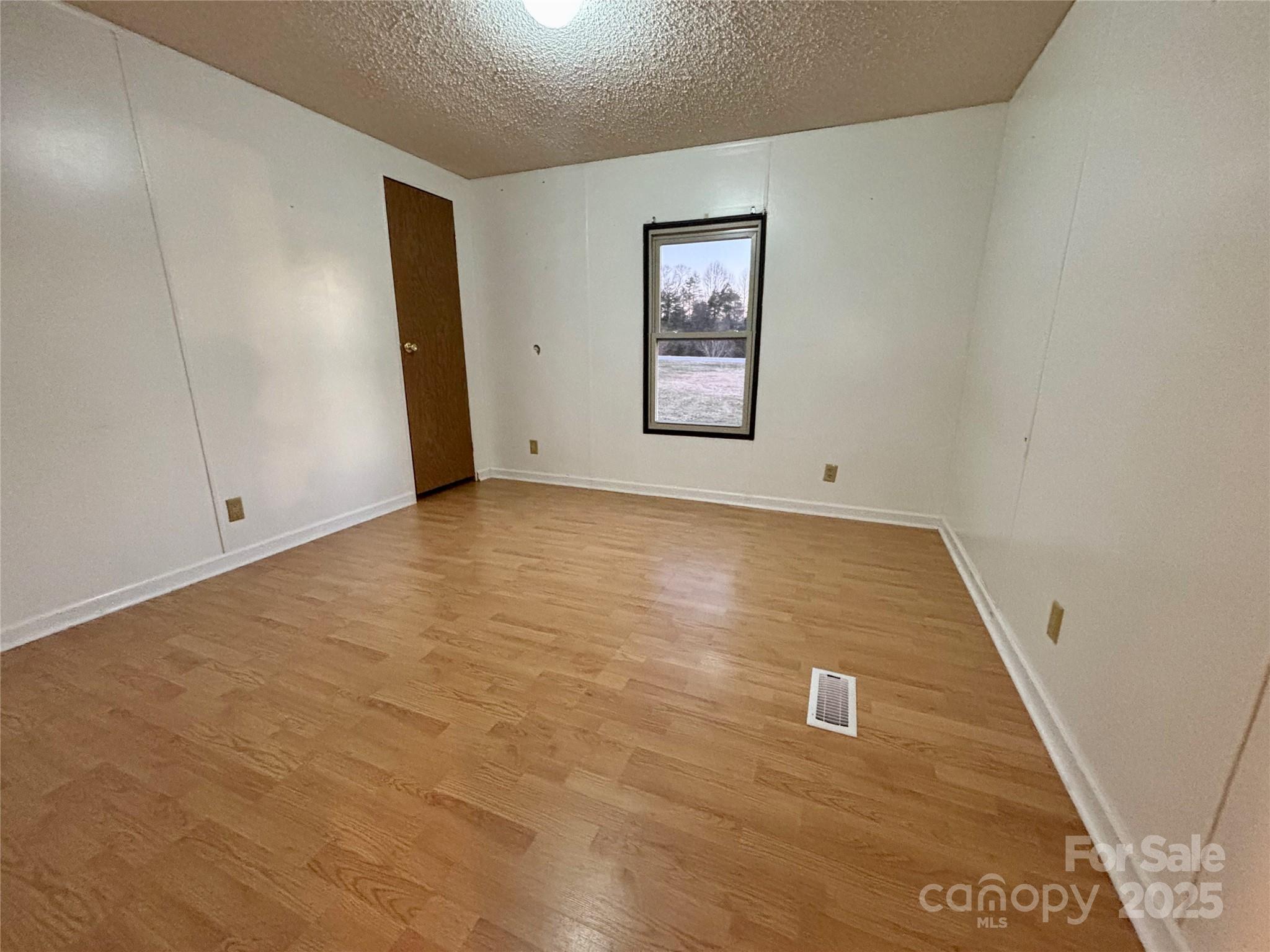 298 West B Phindeck Road Bostic, NC 28018 - Photo 28 of 34 an empty room with windows
