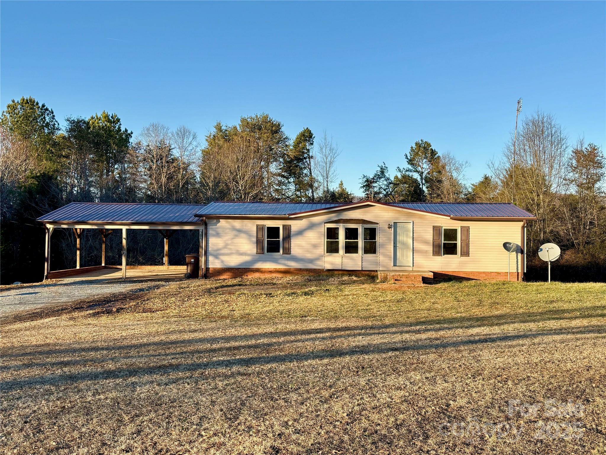 298 West B Phindeck Road Bostic, NC 28018 - Photo 3 of 34 a view of a house with a yard