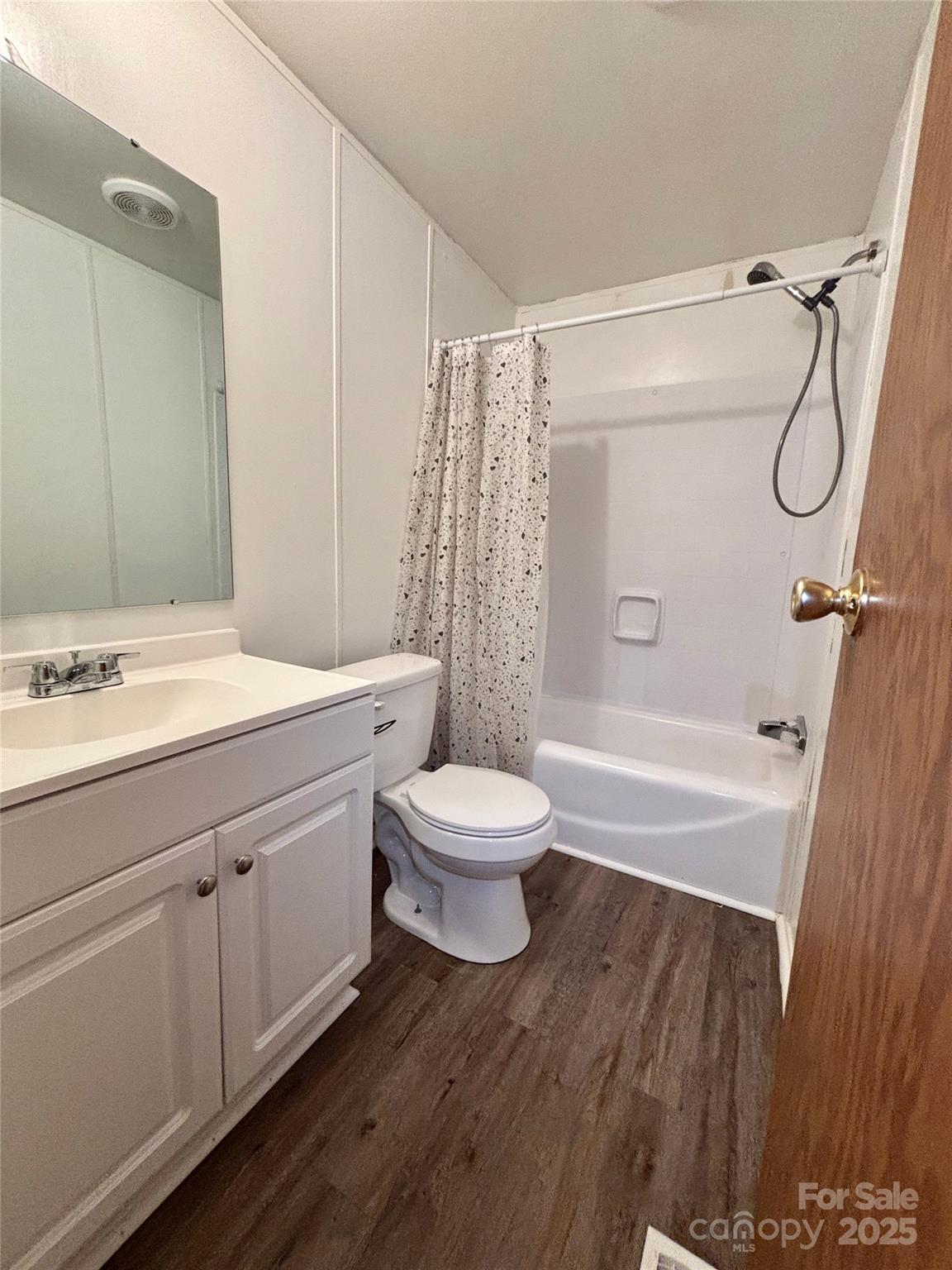 298 West B Phindeck Road Bostic, NC 28018 - Photo 32 of 34 a bathroom with a double vanity sink toilet mirror and shower
