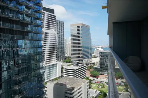 a view of balcony with wooden floor