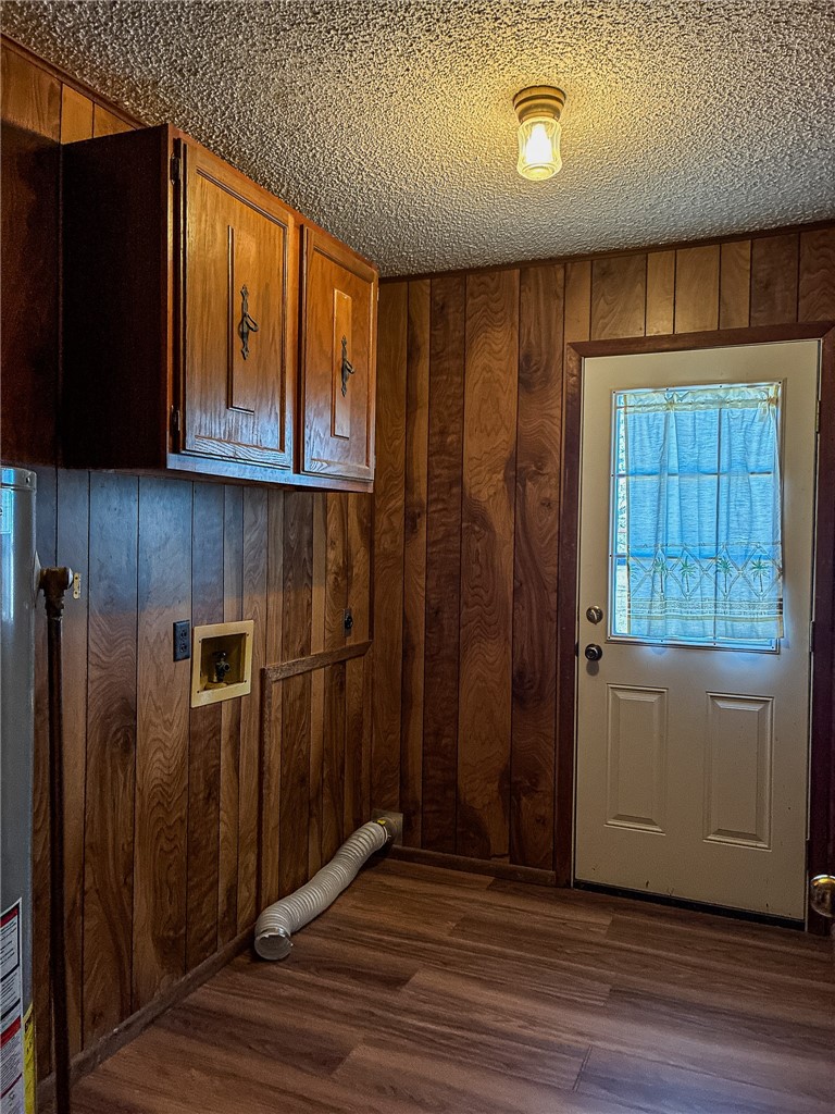 180 Recreation Road 8 Calliham, TX 78007 - Photo 11 of 17 an empty room with wooden floor cabinet and windows