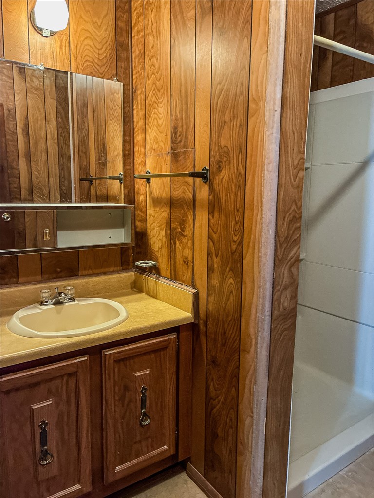 180 Recreation Road 8 Calliham, TX 78007 - Photo 15 of 17 a bathroom with a sink and a mirror