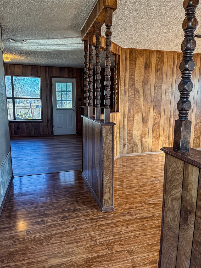 180 Recreation Road 8 Calliham, TX 78007 - Photo 4 of 17 a view of front door with hallway and wooden floor