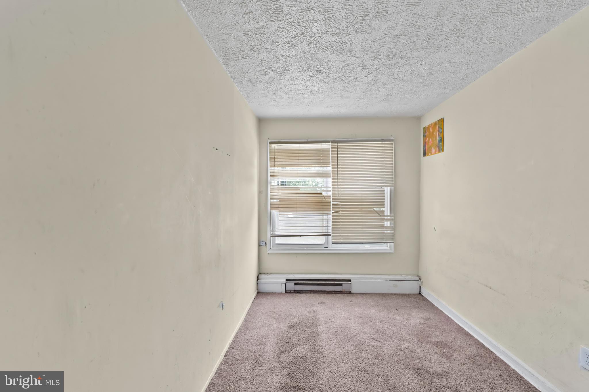 968 Mt Olivet Road Northeast Washington, DC 20002 - Photo 11 of 16 a view of an empty room with a window