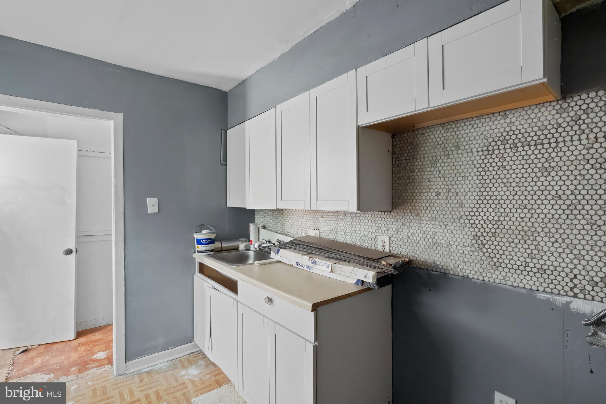 968 Mt Olivet Road Northeast Washington, DC 20002 - Photo 13 of 16 a room with a sink and cabinets