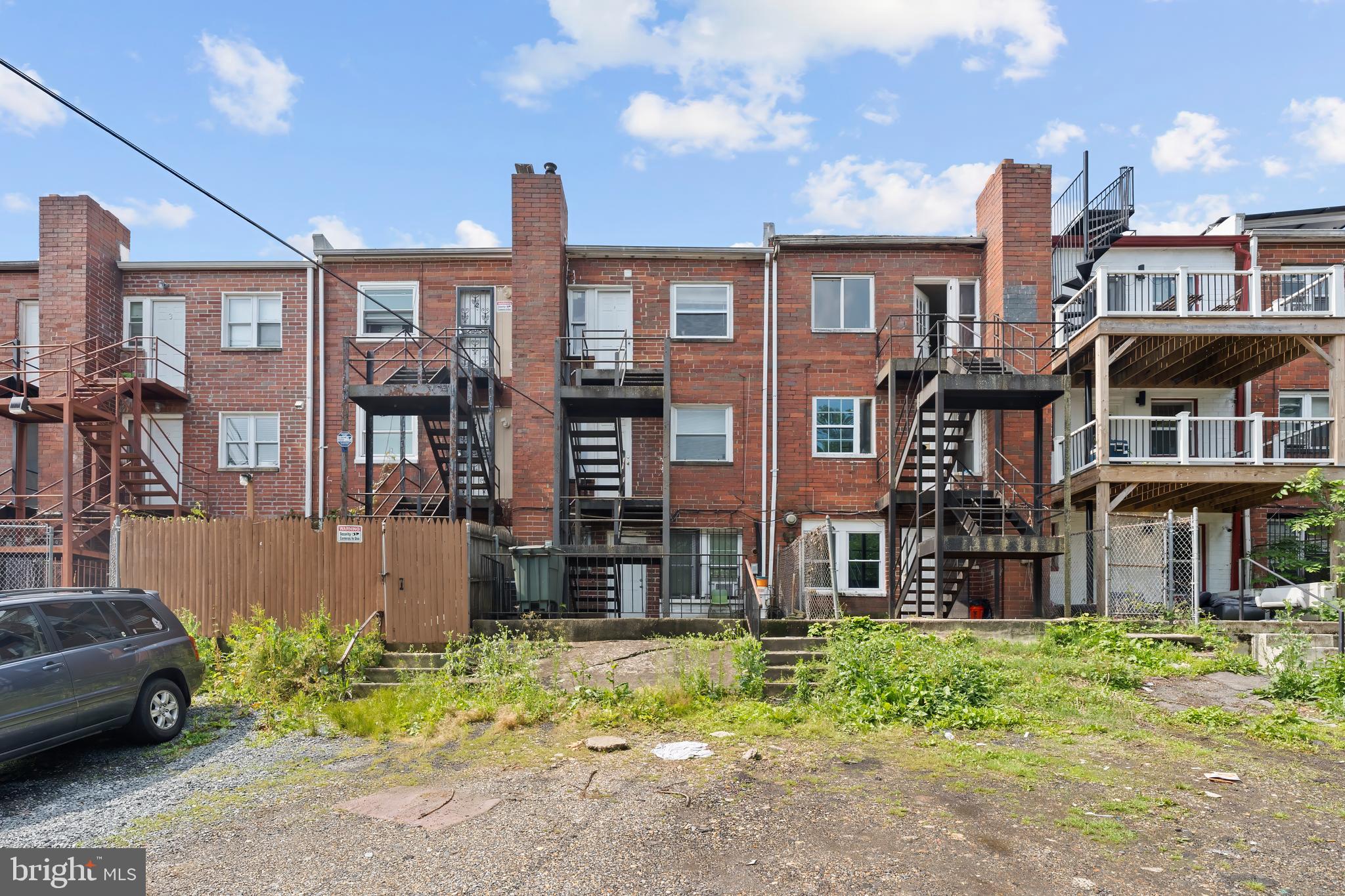968 Mt Olivet Road Northeast Washington, DC 20002 - Photo 16 of 16 a front view of a house with a yard
