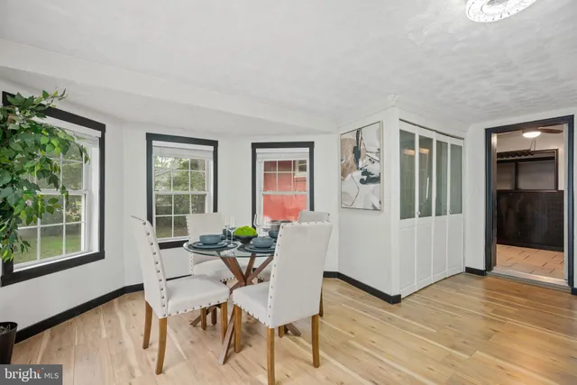 a view of a livingroom with furniture and window