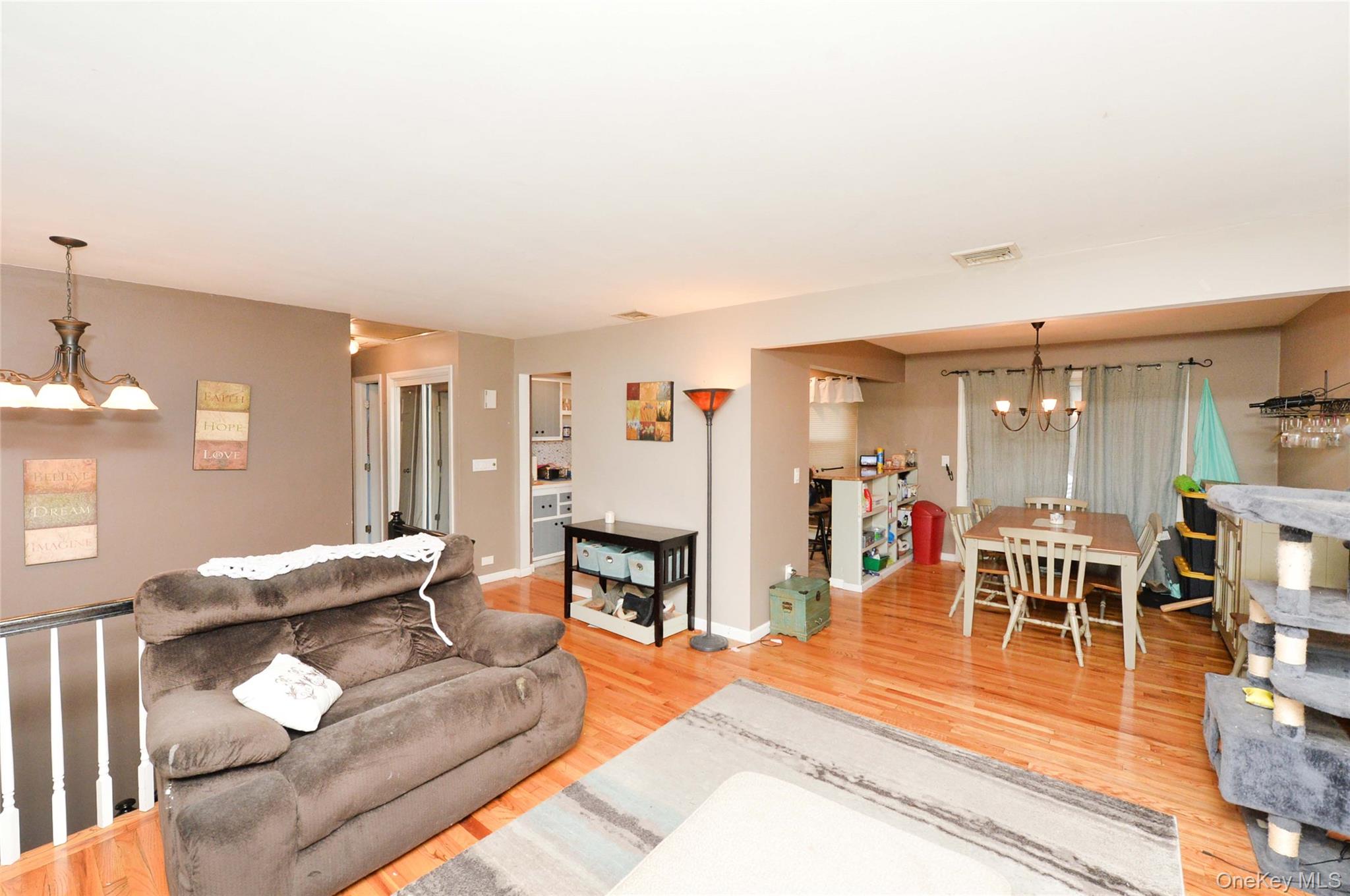 130 Spring Street Goshen, NY 10924 - Photo 7 of 24 a living room with furniture and a wooden floor