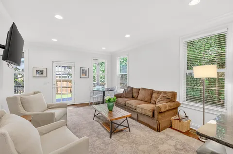 a living room with a couch and a table