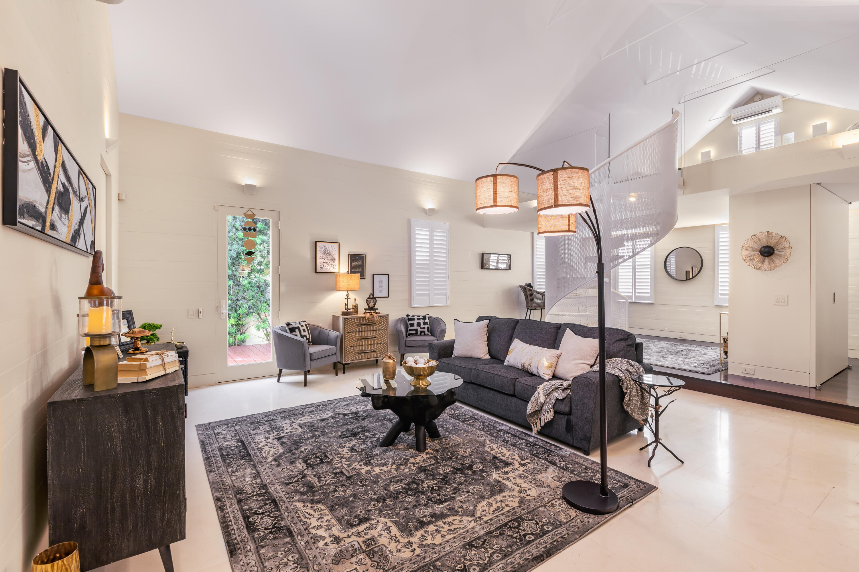 711 Elizabeth Street Key West, FL 33040 - Photo 14 of 36 a living room with furniture and wooden floor