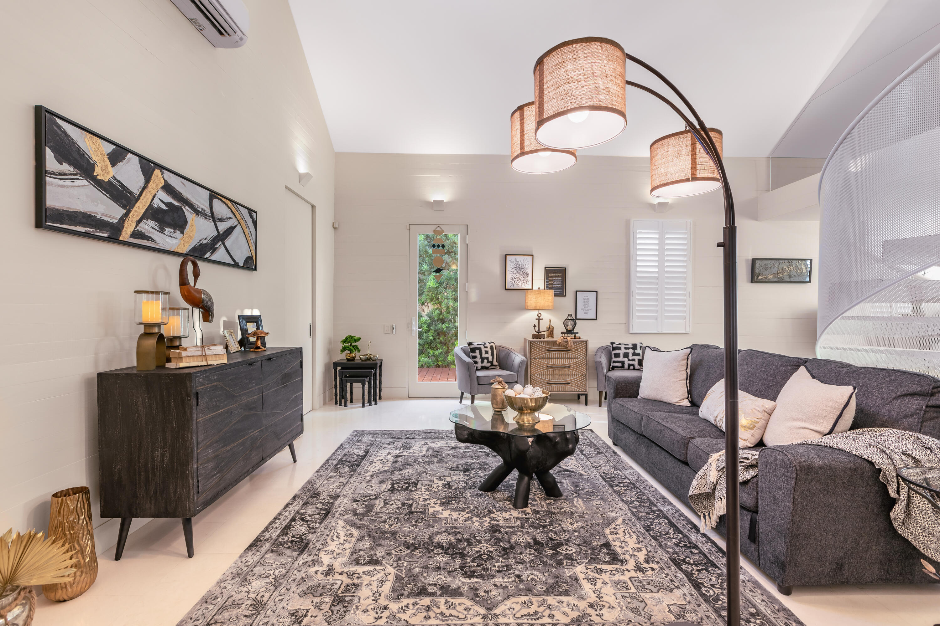 711 Elizabeth Street Key West, FL 33040 - Photo 17 of 36 a living room with furniture and a mirror