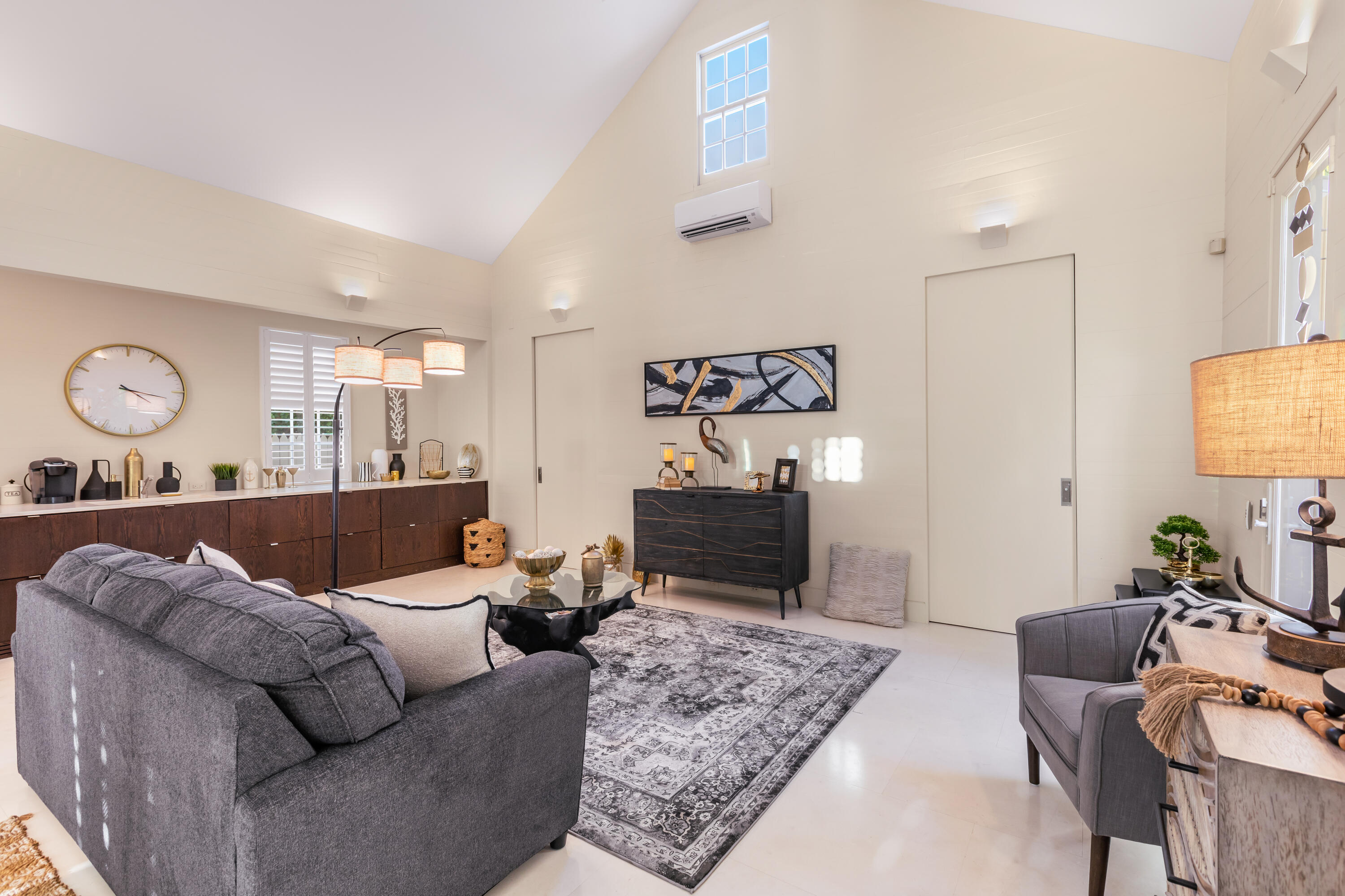 711 Elizabeth Street Key West, FL 33040 - Photo 18 of 36 a living room with furniture and a flat screen tv