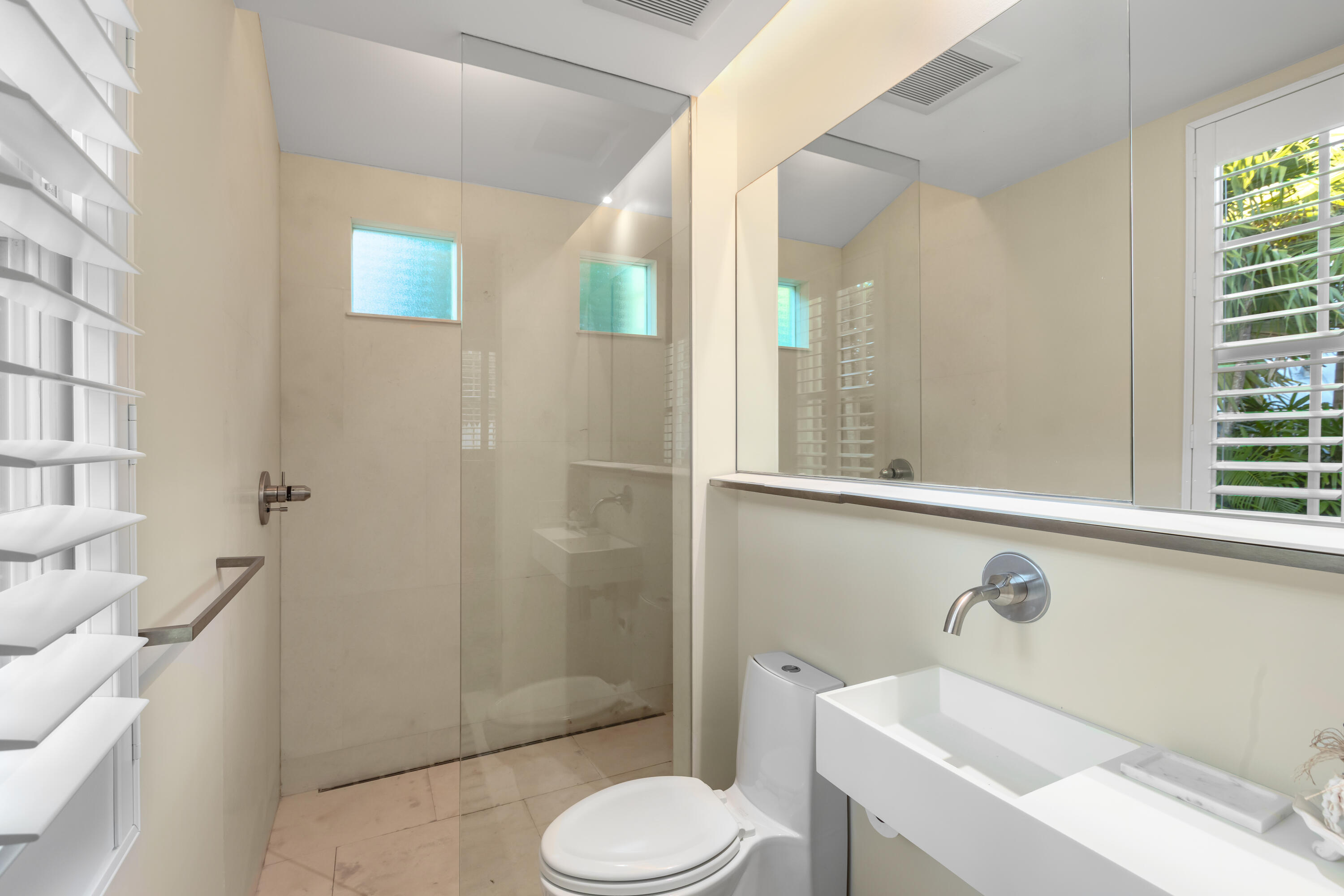 711 Elizabeth Street Key West, FL 33040 - Photo 29 of 36 a bathroom with a sink and a toilet