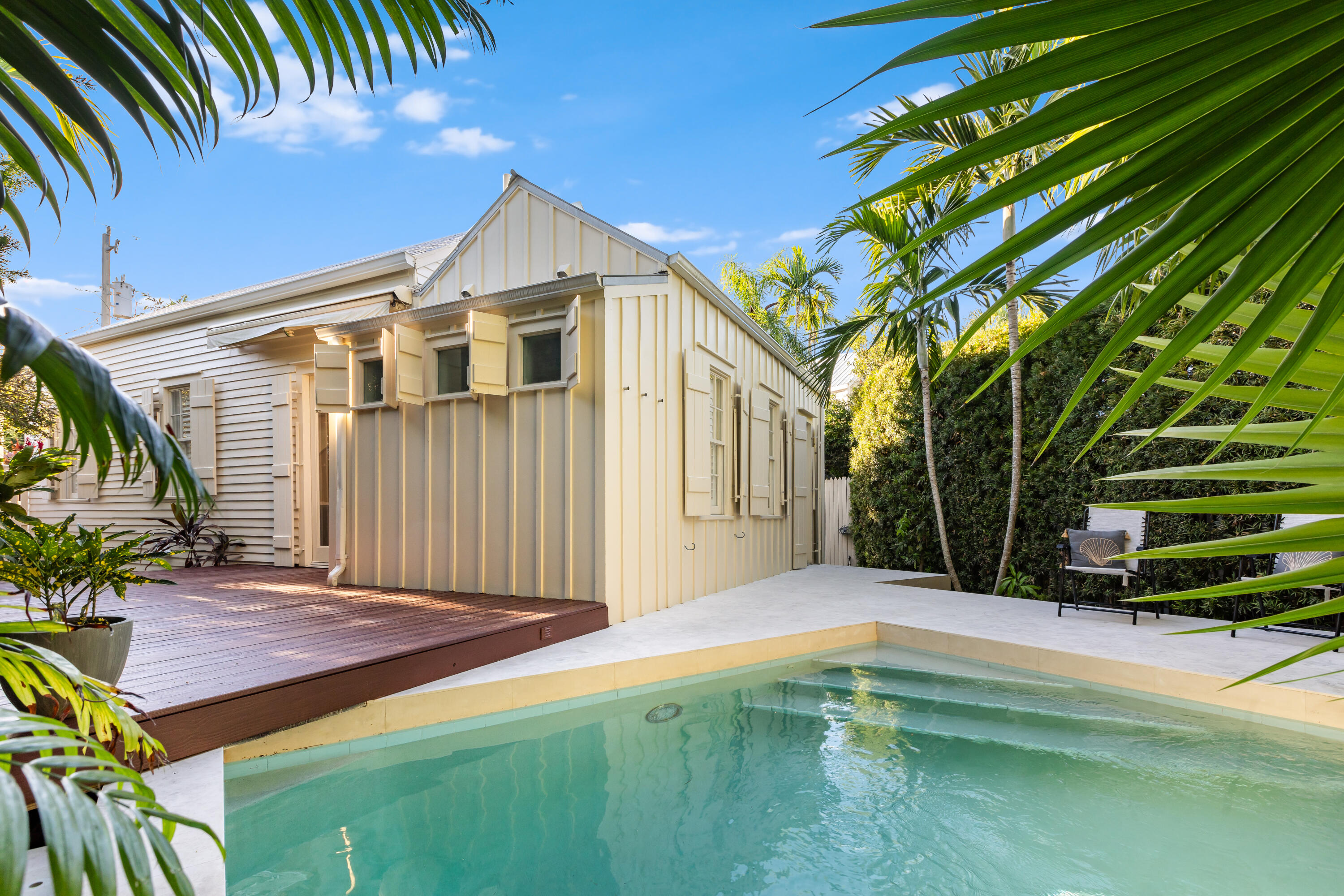 711 Elizabeth Street Key West, FL 33040 - Photo 32 of 36 a front view of a house with a garden