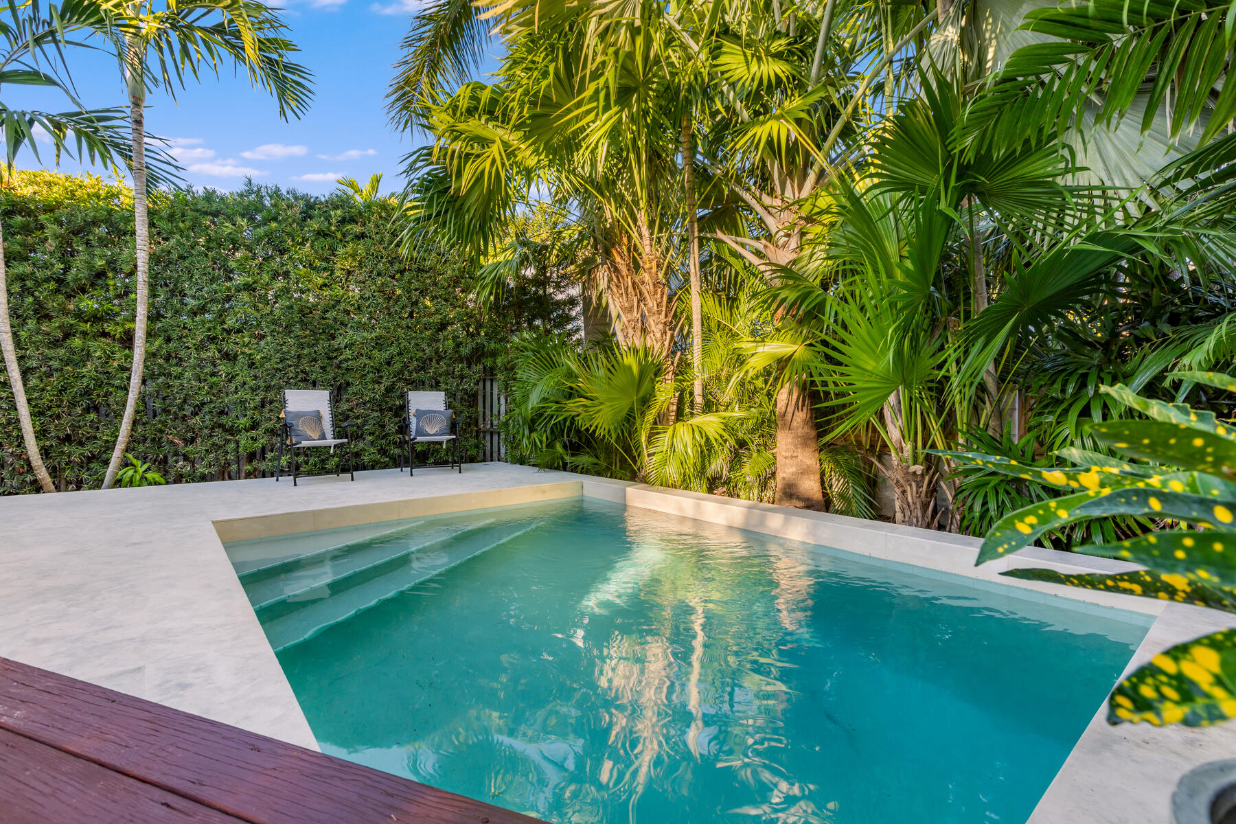 711 Elizabeth Street Key West, FL 33040 - Photo 33 of 36 a view of a swimming pool with a yard