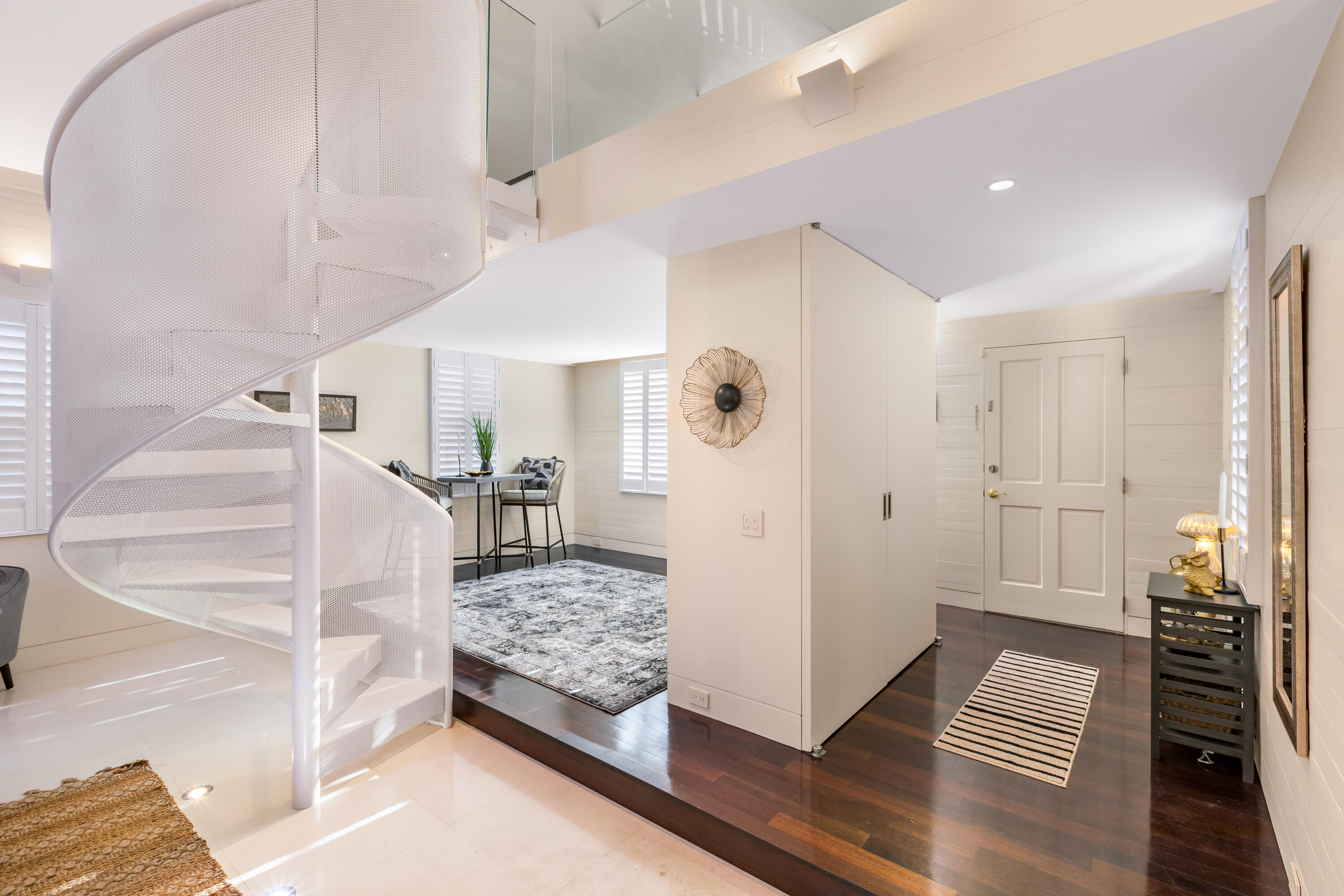711 Elizabeth Street Key West, FL 33040 - Photo 8 of 36 a view of entryway and hall with wooden floor