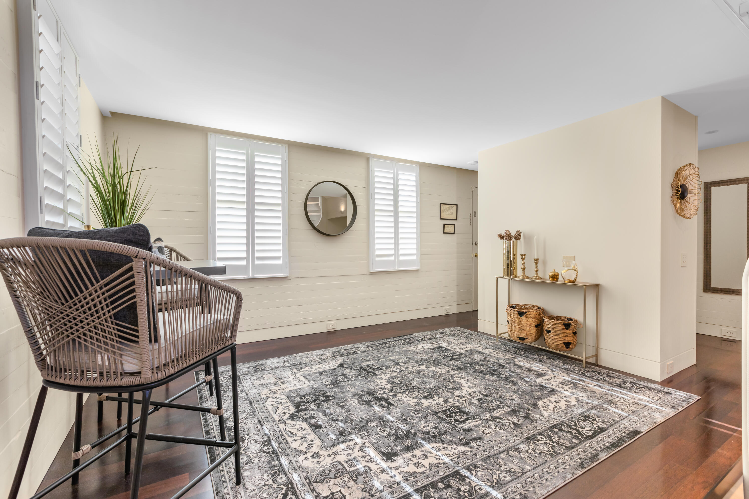 711 Elizabeth Street Key West, FL 33040 - Photo 10 of 36 a living room with couch chairs and a clock
