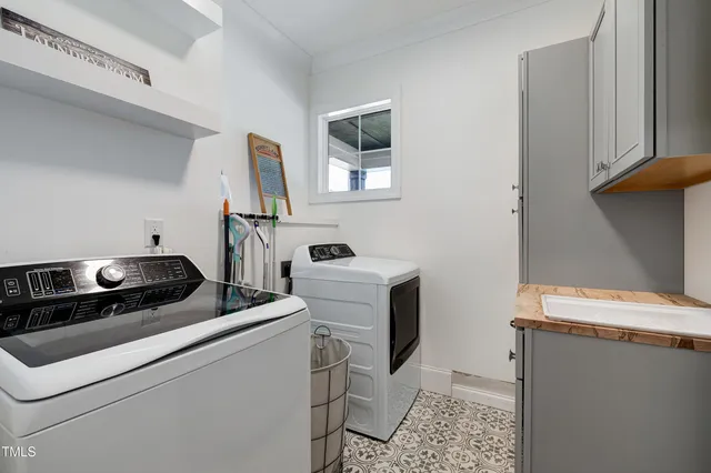 a view of an empty room with stairs