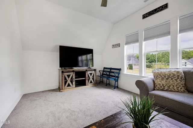 a view of outdoor space with garden and trees