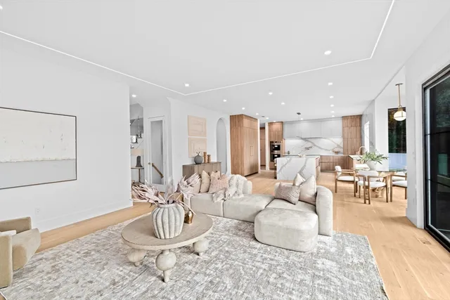 a living room with furniture and a table