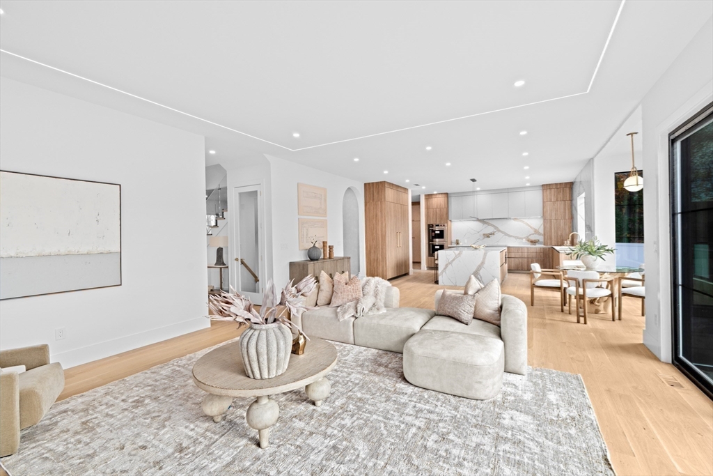 36 Roland Street Newton, MA 02461 - Photo 12 of 42 a living room with furniture and a table