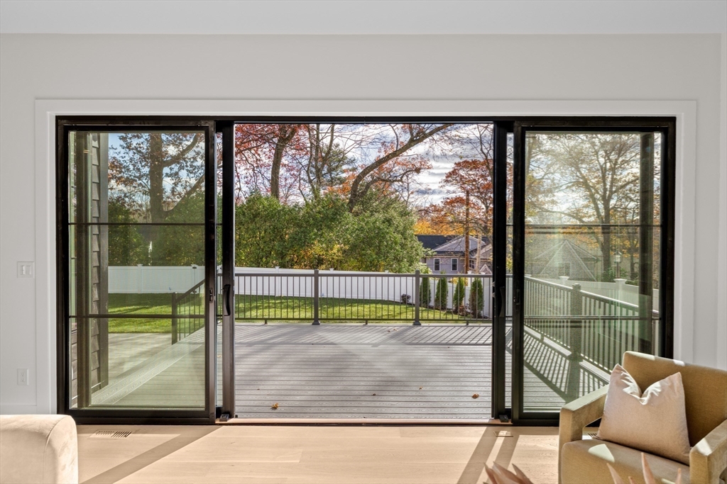 36 Roland Street Newton, MA 02461 - Photo 14 of 42 a view of a room and floor to ceiling window