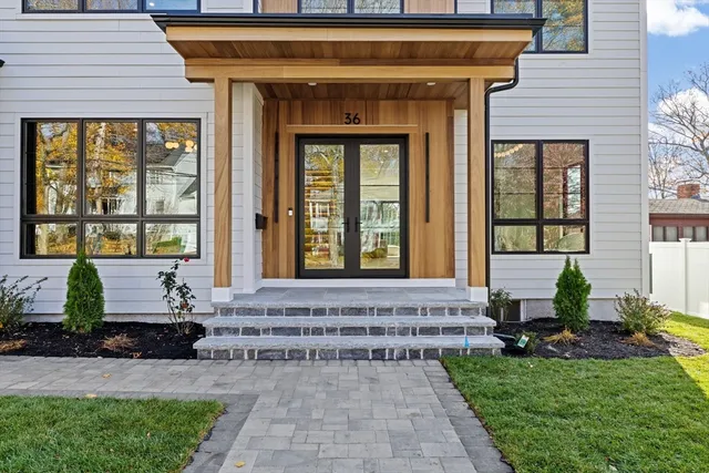 a front view of a house with a porch
