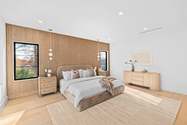 a bedroom with furniture and window