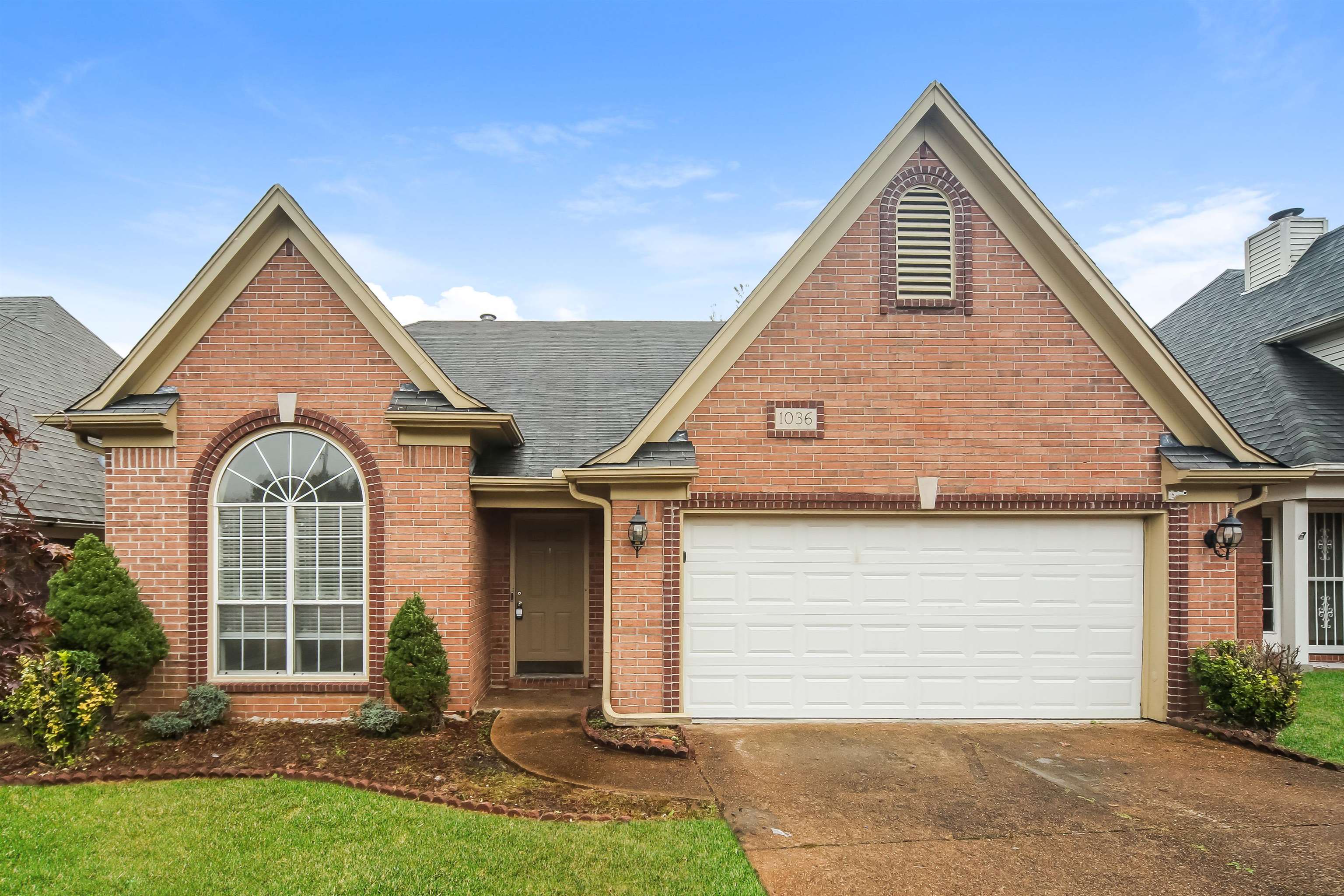 1036 Dusty Lane Cordova, TN 38018 - Photo 3 of 16 a view of a house with yard and garage