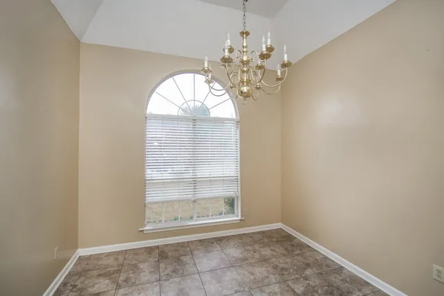 en view of an empty room with a window