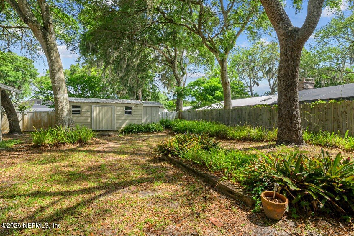 409 Lobelia Road St. Augustine, FL 32086 - Photo 31 of 43 409 Lobelia Rd yard and shed
