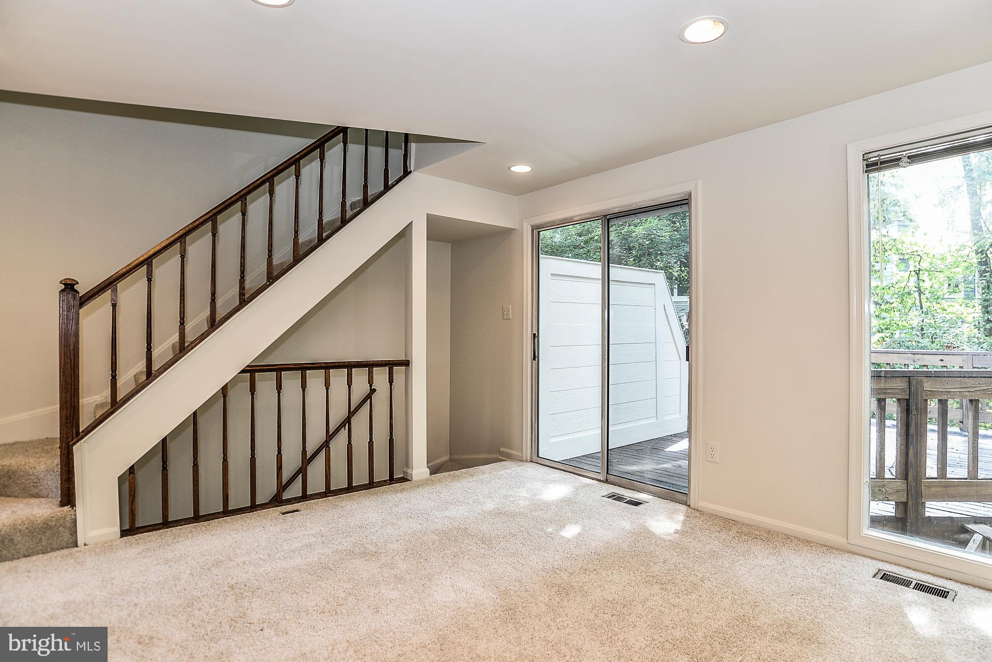 2155 Whisper Way Reston, VA 20191 - Photo 10 of 32 Exit to big deck surrounded by trees!