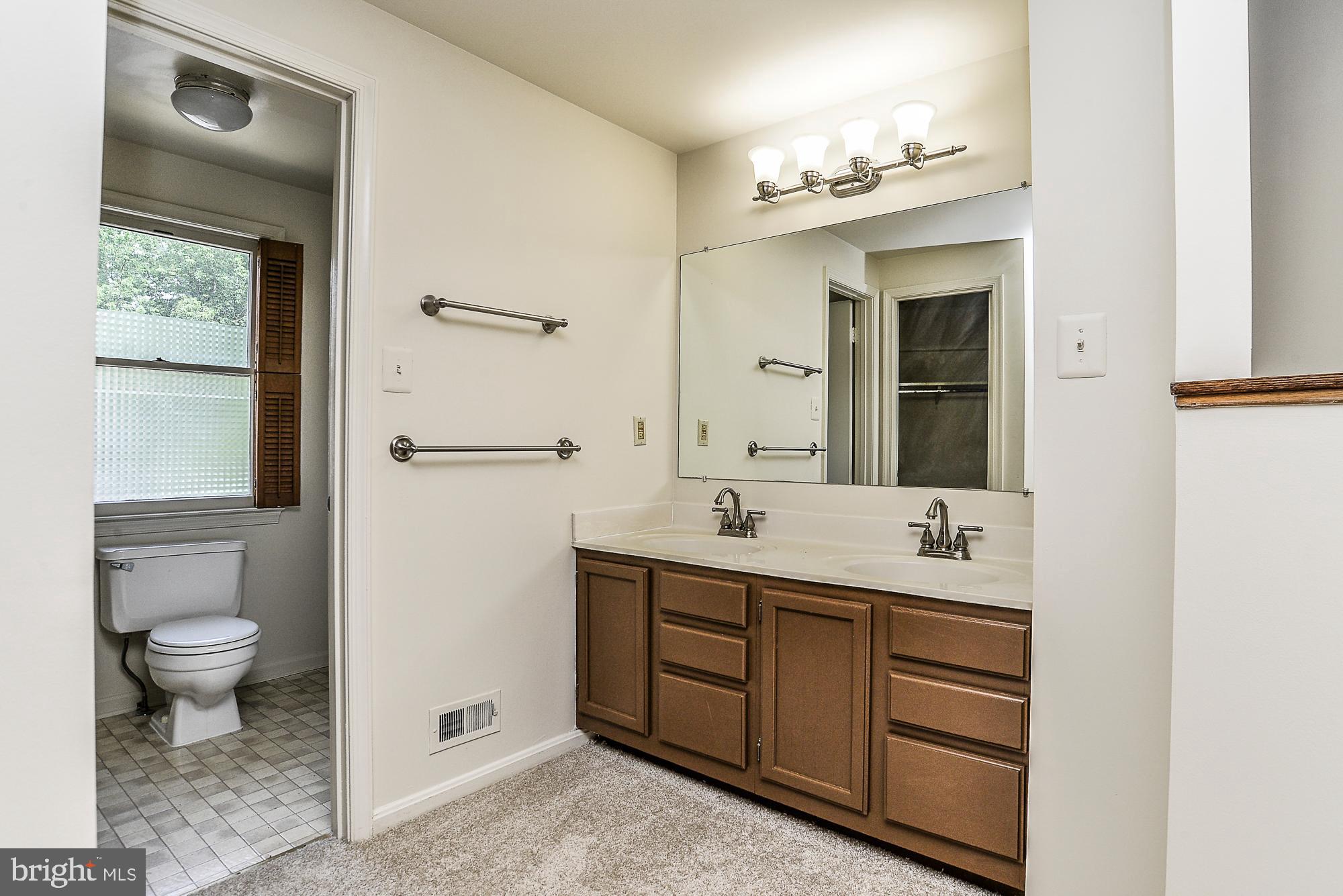 2155 Whisper Way Reston, VA 20191 - Photo 17 of 32 Dual sink vanity with designer fixtures