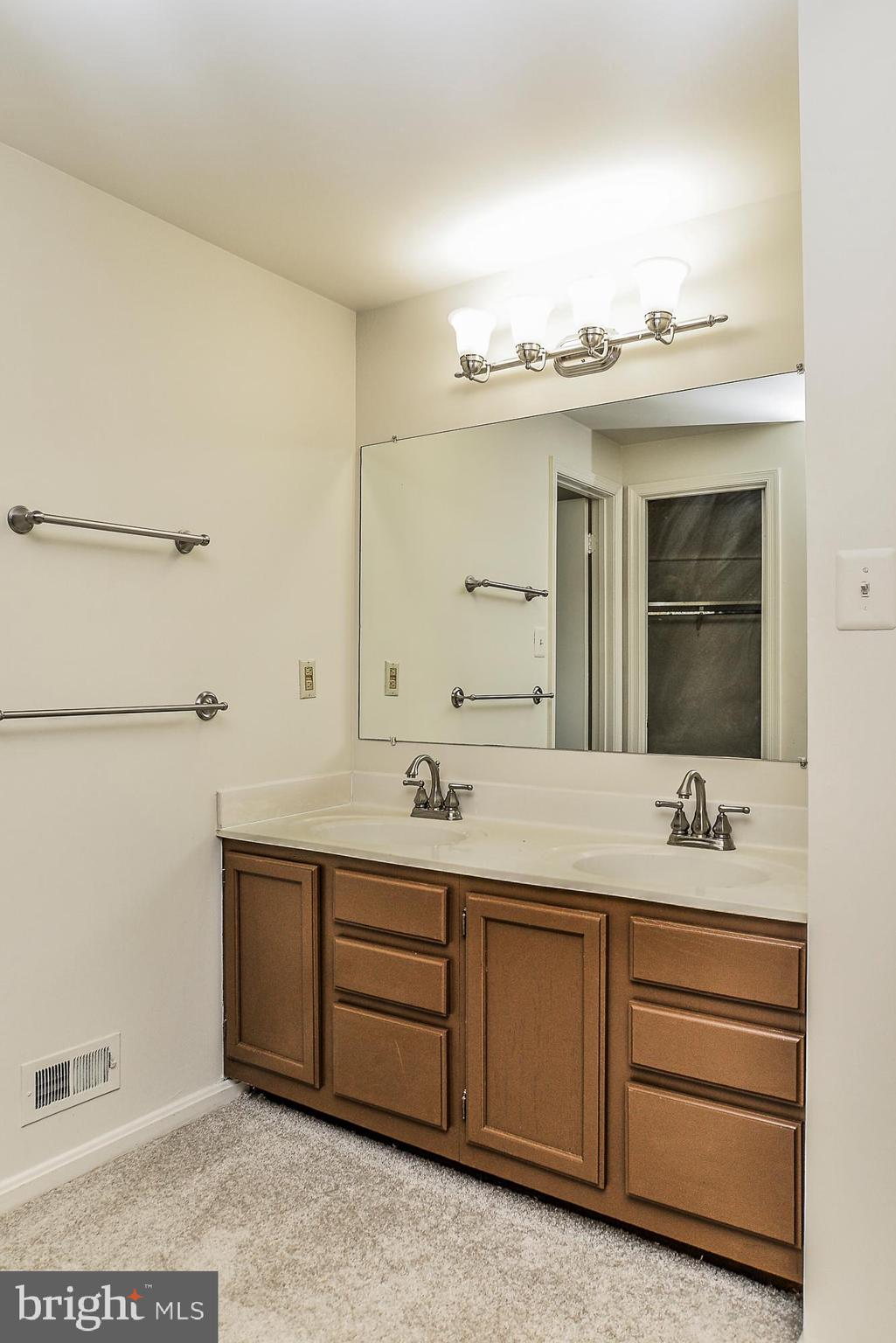 2155 Whisper Way Reston, VA 20191 - Photo 18 of 32 Contemporary lighting, hardware & opens to bath