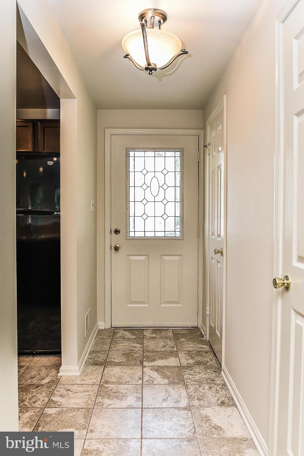 2155 Whisper Way Reston, VA 20191 - Photo 3 of 32 Open & airy foyer with newer ceramic title floor