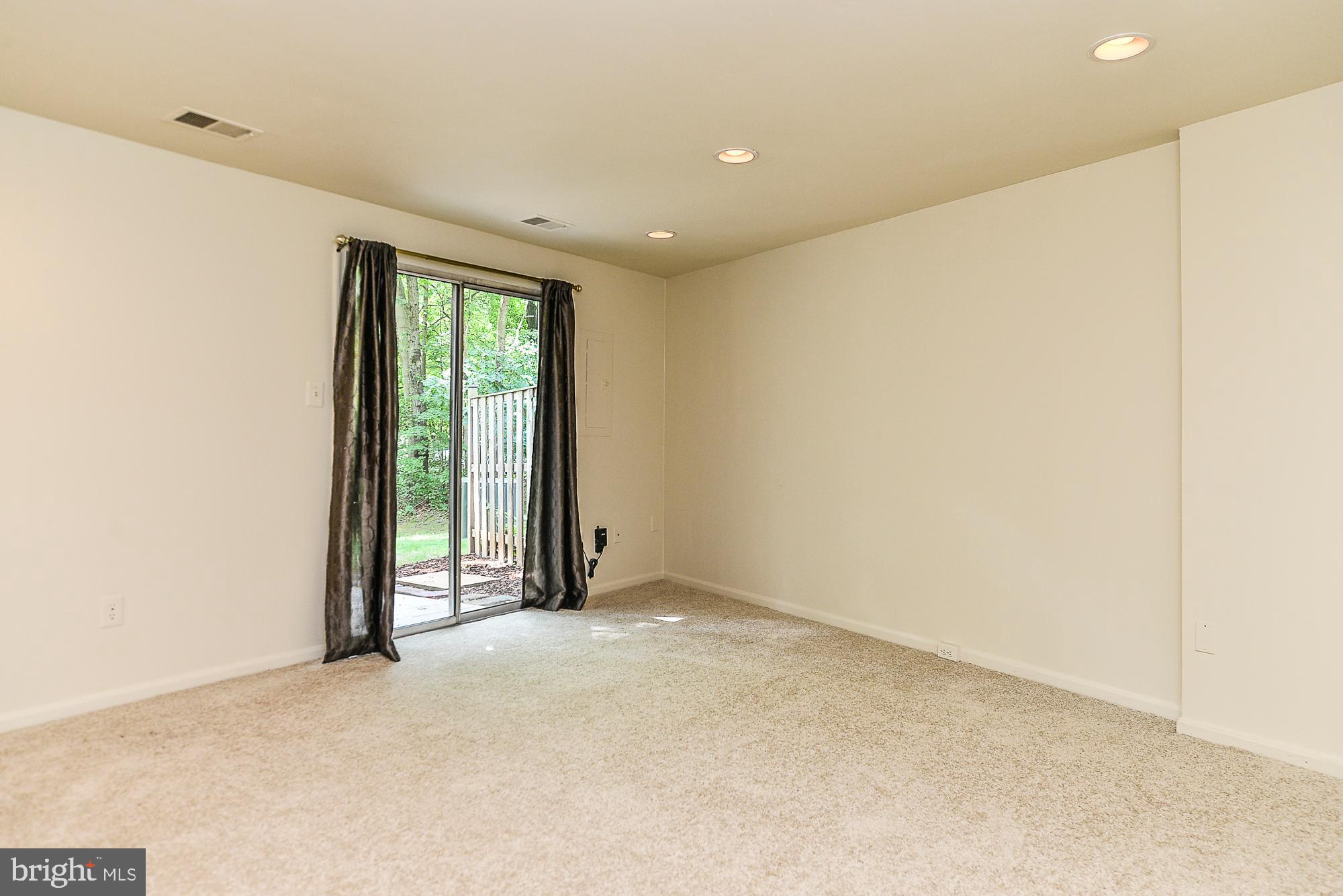 2155 Whisper Way Reston, VA 20191 - Photo 25 of 32 Lots of recessed lights, 2 closets & exit to yard!