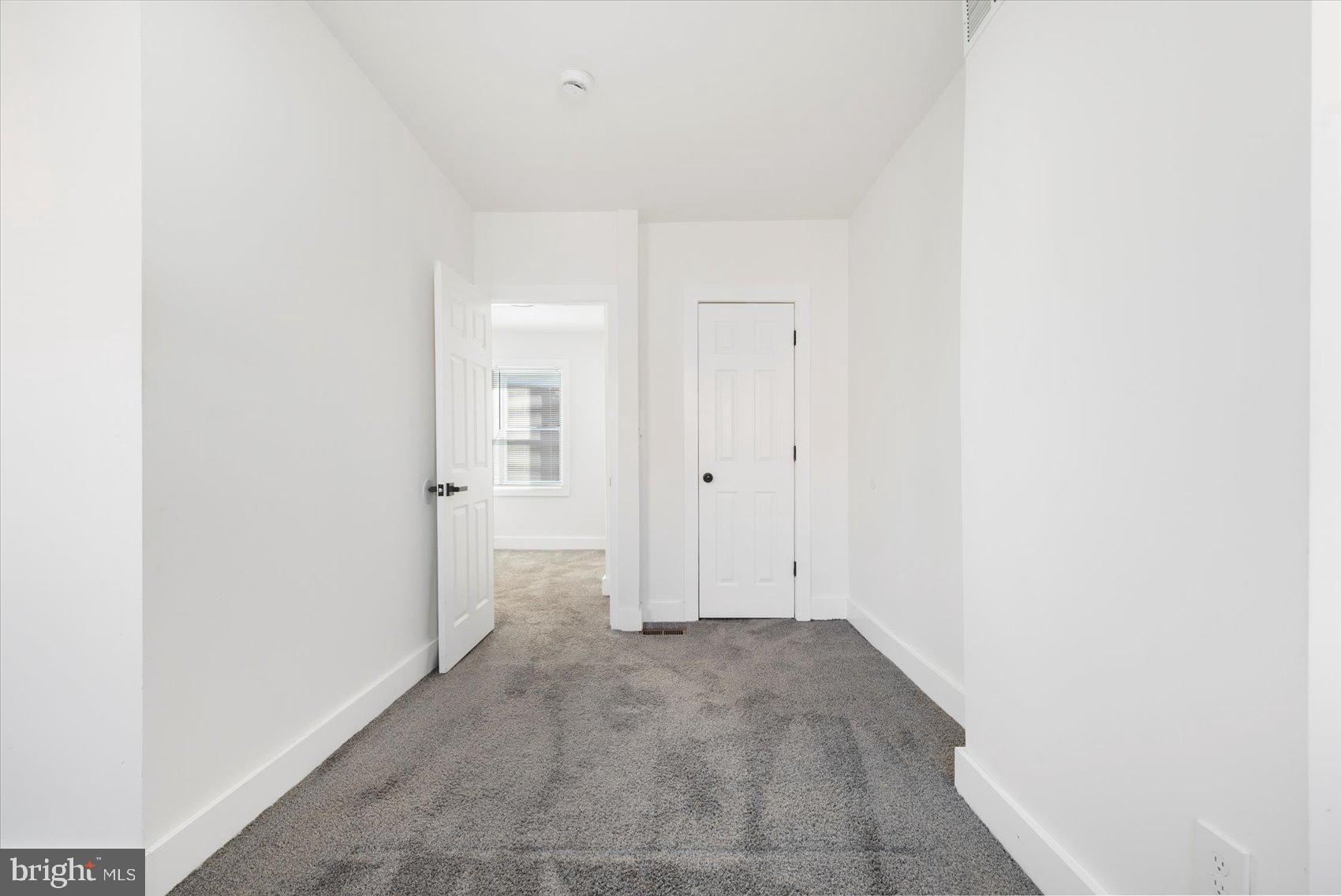 847 Reinhardt Street Baltimore, MD 21230 - Photo 21 of 41 an empty room with a natural light