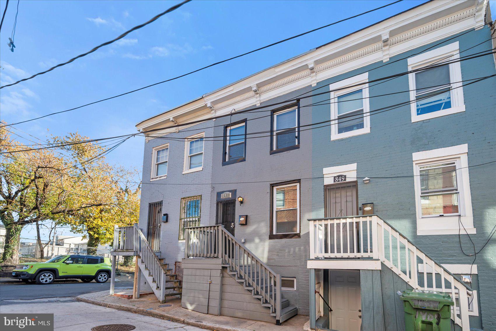 847 Reinhardt Street Baltimore, MD 21230 - Photo 3 of 41 a front view of a building with glass windows