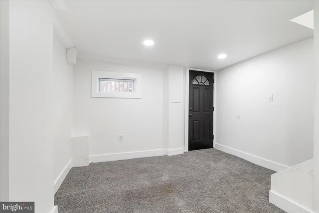 an empty room with an entryway