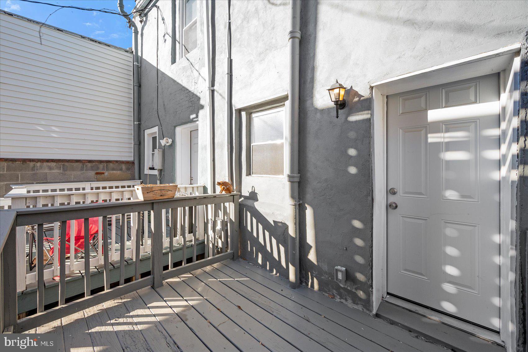 847 Reinhardt Street Baltimore, MD 21230 - Photo 41 of 41 a view of a balcony with wooden floor