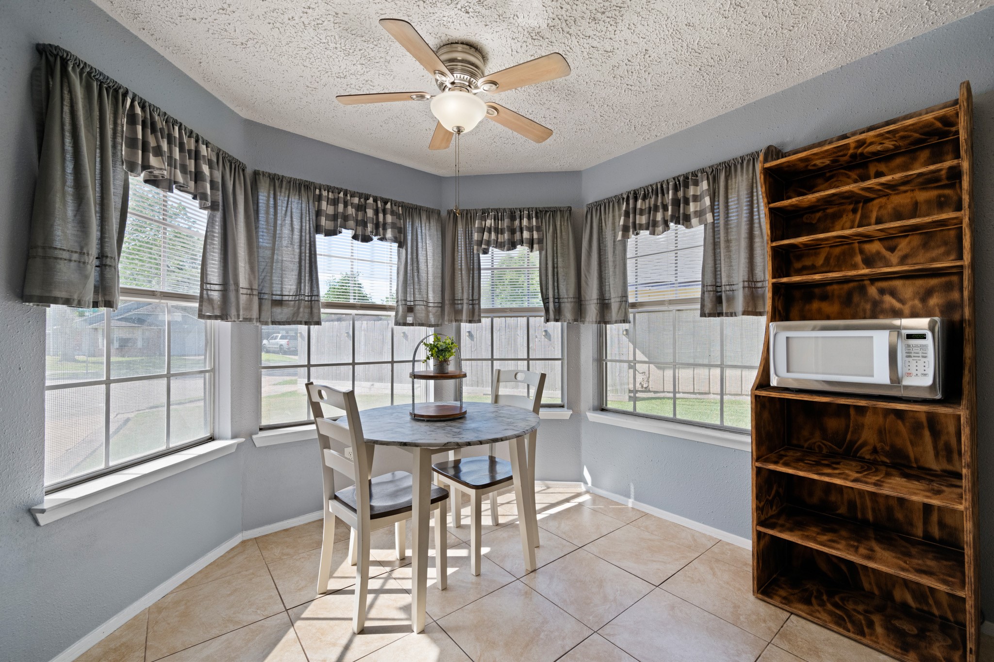 1804 Spruce Drive Rosenberg, TX 77471 - Photo 14 of 29 a view of a dining room with furniture and window