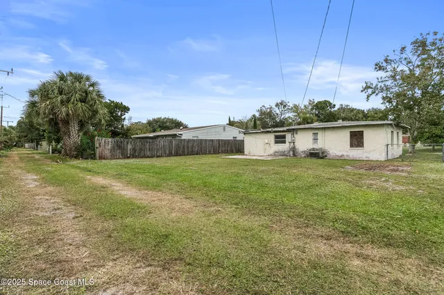 a house view with a garden space