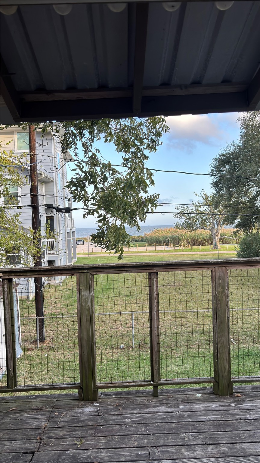 4911 Oleander Street, Unit B Pasadena, TX 77586 - Photo 3 of 34 a view of a lake from a balcony