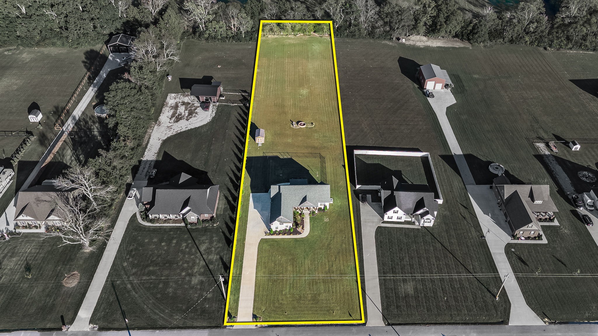 1176 Norton Road Manchester, TN 37355 - Photo 3 of 45 an aerial view of residential houses with outdoor space