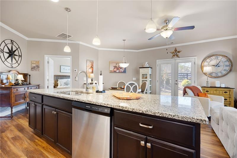 80 Azalea Crossing Dallas, GA 30132 - Photo 12 of 38 a bathroom with a granite countertop sink a toilet and a mirror