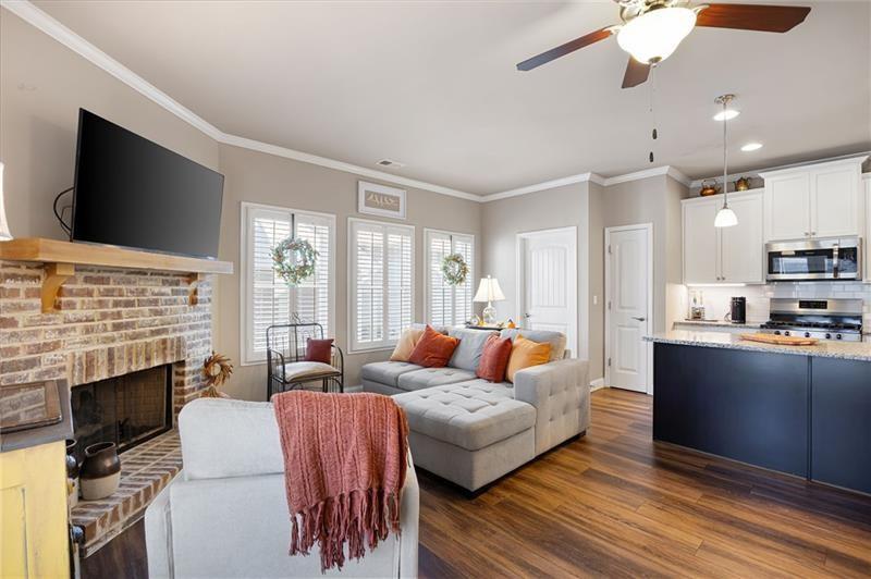 80 Azalea Crossing Dallas, GA 30132 - Photo 16 of 38 a living room with furniture fireplace and flat screen tv