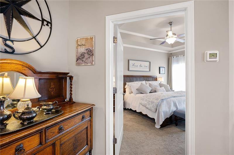 80 Azalea Crossing Dallas, GA 30132 - Photo 20 of 38 a bedroom with a bed and the mirror