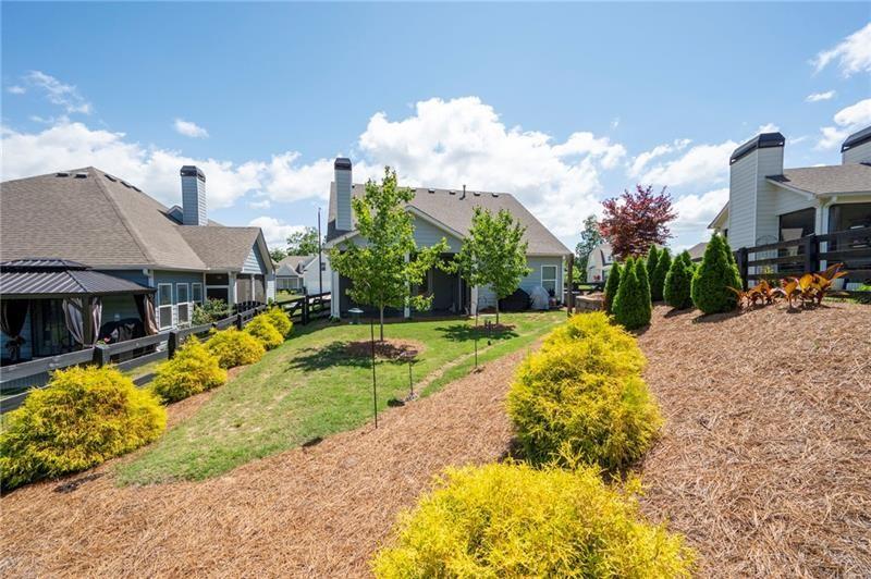 80 Azalea Crossing Dallas, GA 30132 - Photo 33 of 38 a front view of a house with swimming pool