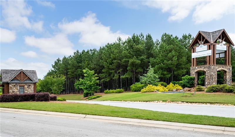 80 Azalea Crossing Dallas, GA 30132 - Photo 37 of 38 a front view of a house with a yard and trees