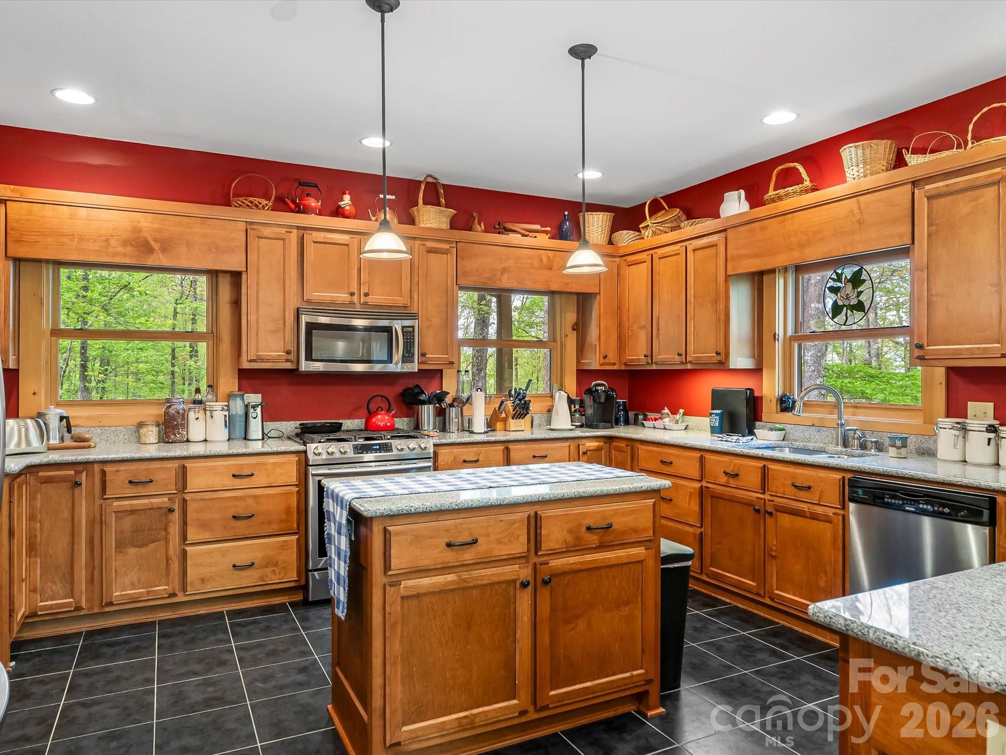 917 Otter Mountain Road Topton, NC 28781 - Photo 15 of 48 a kitchen with a sink stove and window